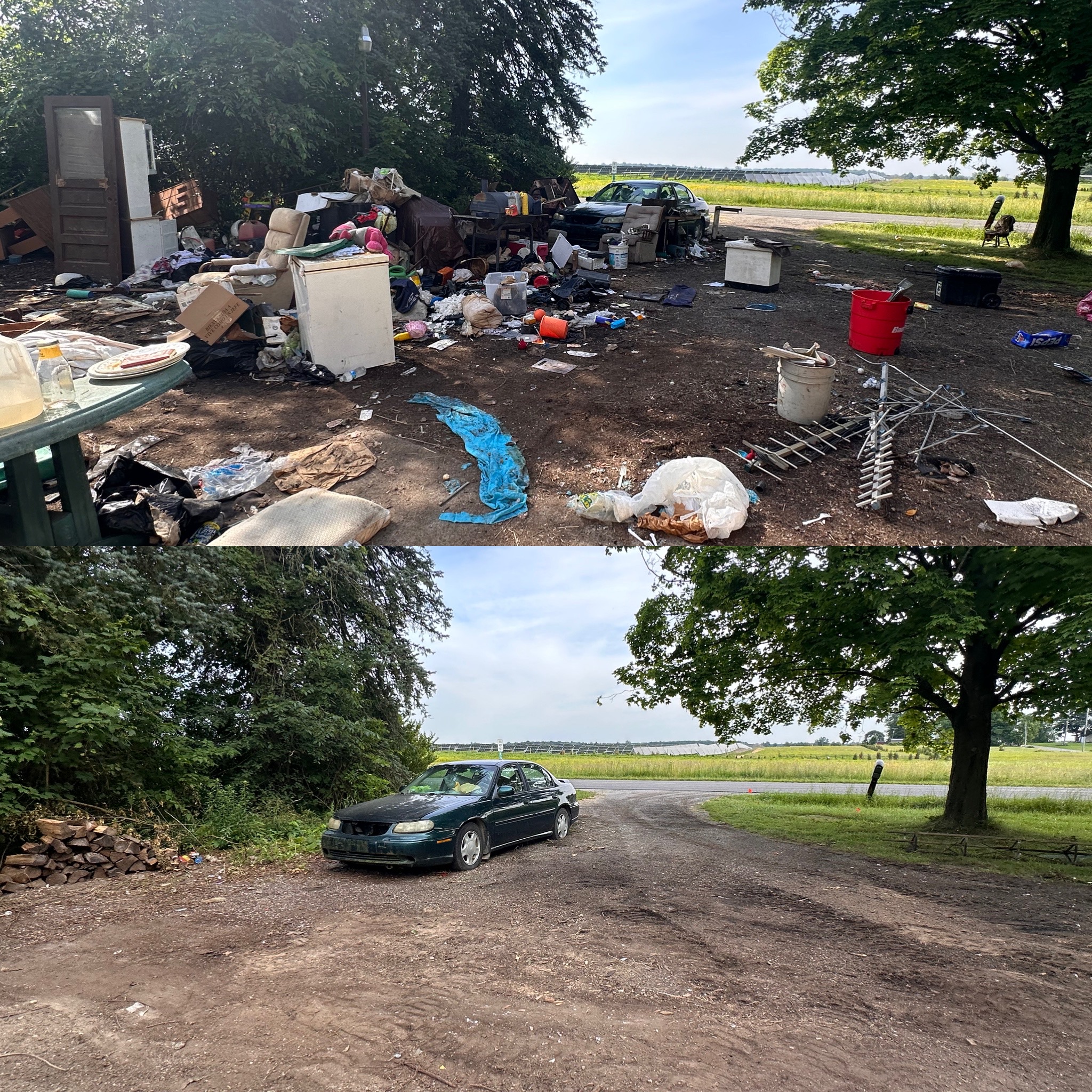 A car and huge pile of outdoor debris with trash and a tree